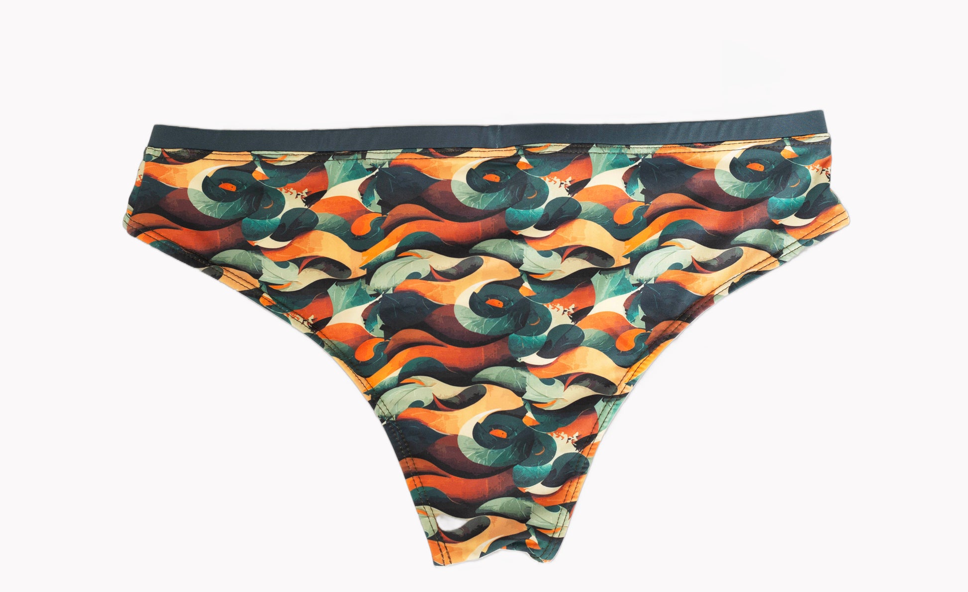designer swim briefs in tropical colorful print inspired by manuel antonio costa rica. back side. 