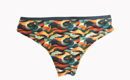 designer swim briefs in tropical colorful print inspired by manuel antonio costa rica. back side. 